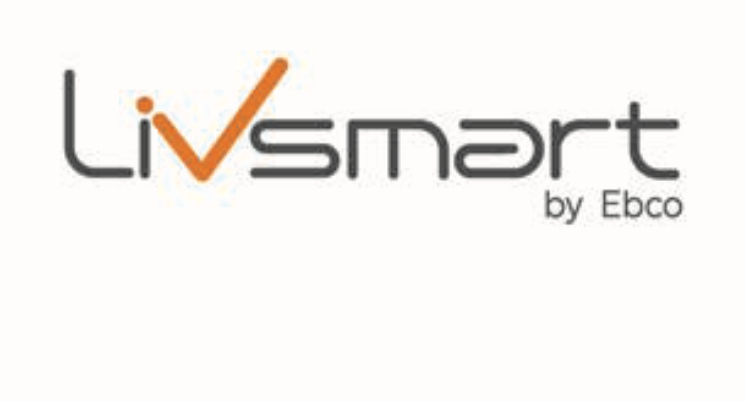 Minimalist home decor items including vases, candles, and artwork arranged on a shelf